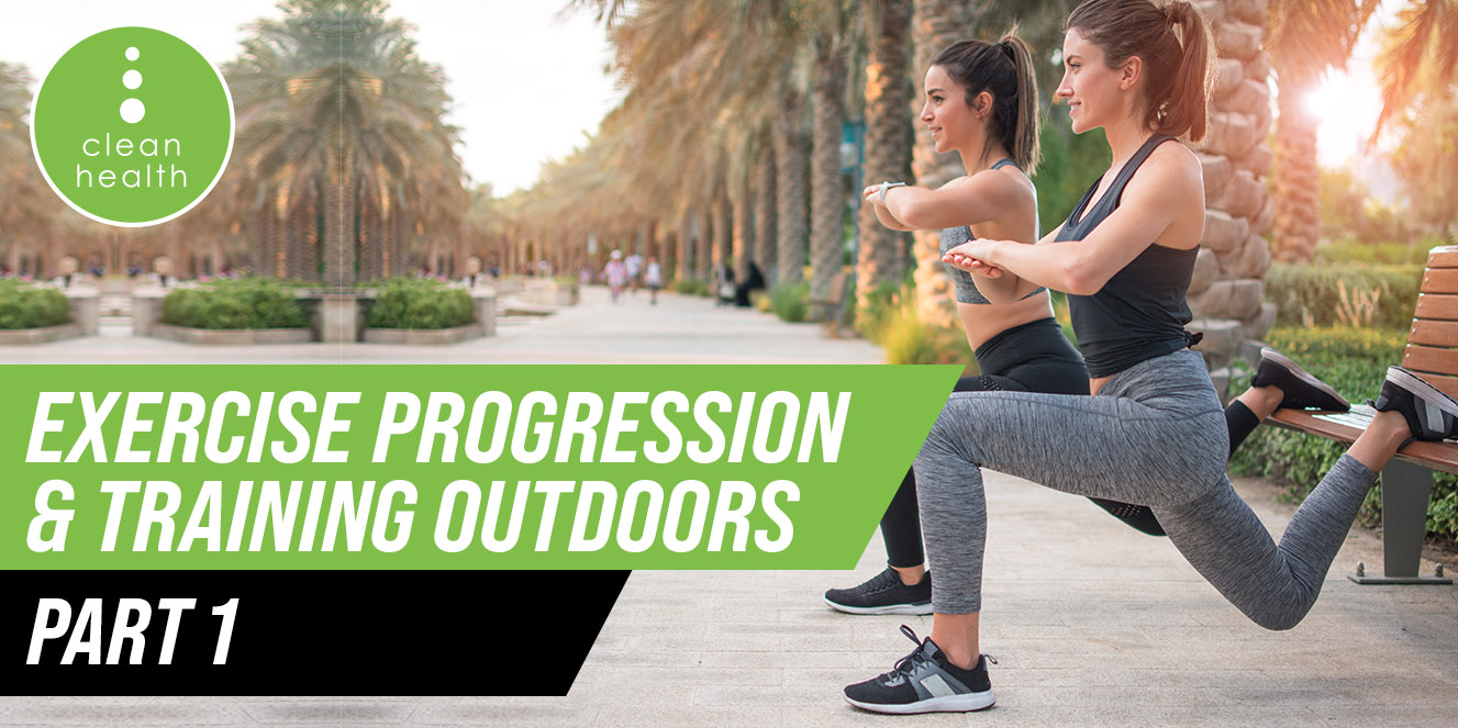 Fit man warming up doing squats stretching arms forward outdoors